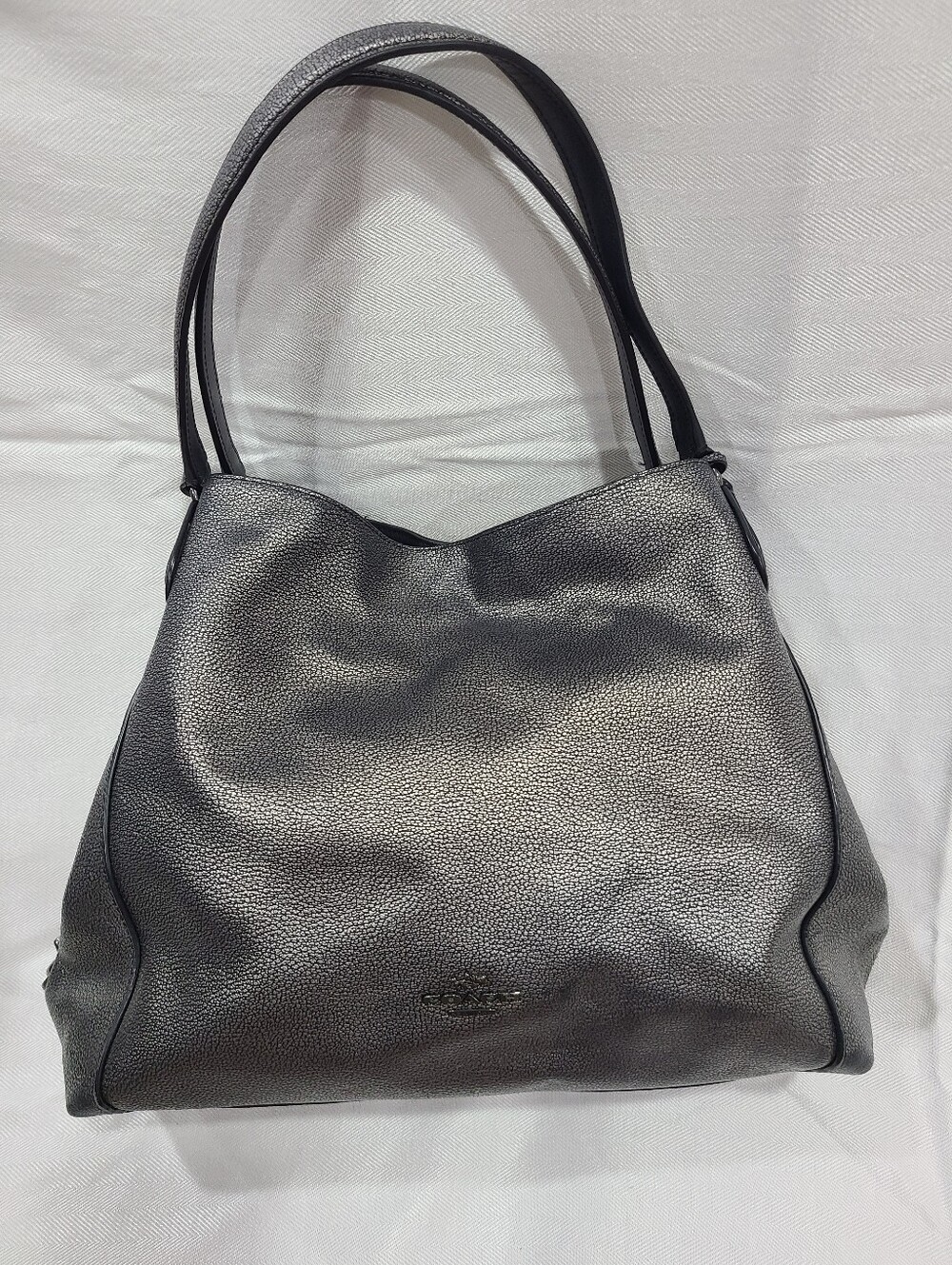 Coach Edie 31 shoulder bag in metallic gunmetal pebbled leather.